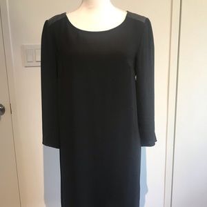 Black dress with fake leather shoulder detail